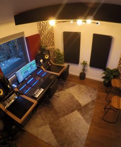 Home Studio with Impression Pro Series corner Bass Traps in Braids pattern in blonde veneer stacked in corners and gotham diffusors on back wall